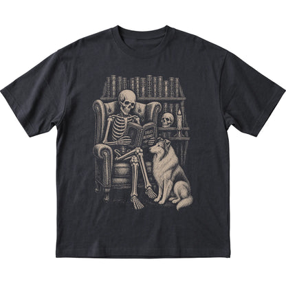 Skeleton reading Tales Beyond to a Collie on a Black T-shirt