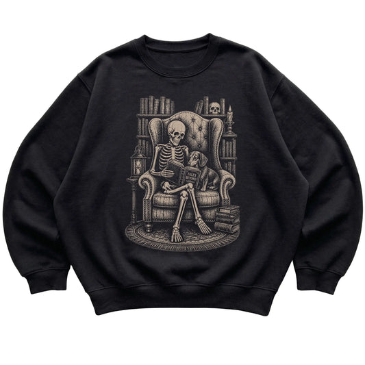 Skeleton reading Tales Beyond to a Dachshund on a Black sweatshirt