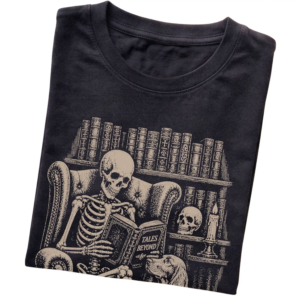 Folded Black T-shirt with a skeleton reading Tales Beyond to an Irish Setter