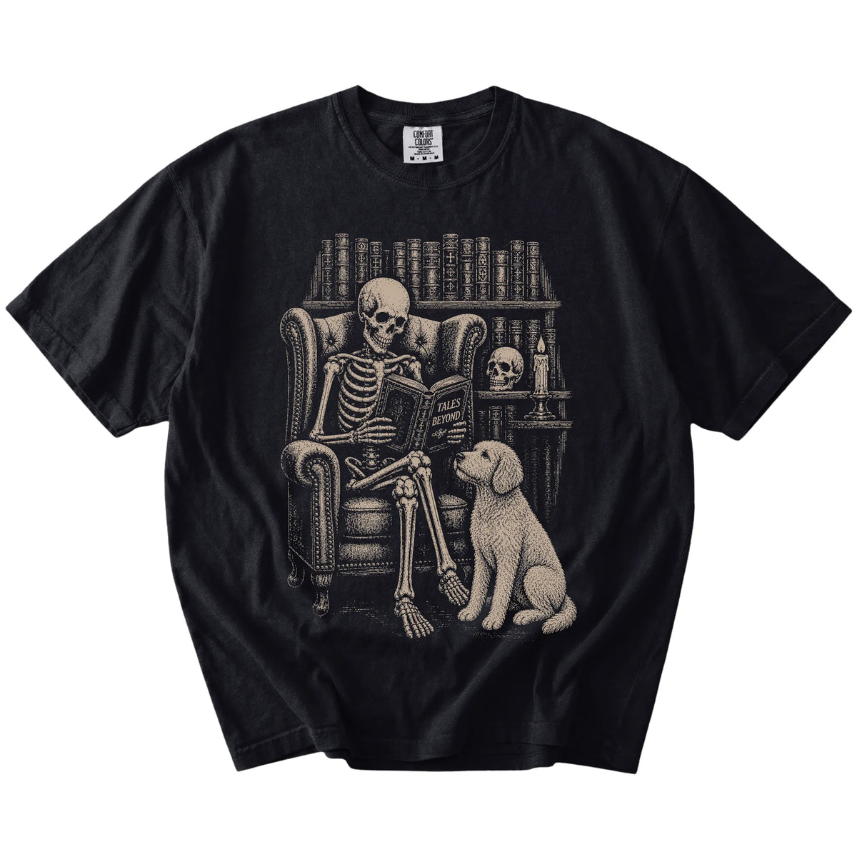 Skeleton reading in a library beside a Labradoodle on a Black Comfort Colors® T-shirt