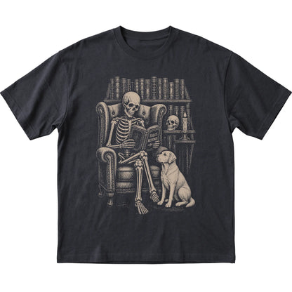 Skeleton reading Tales Beyond to a Labrador Retriever on a Black T-shirt