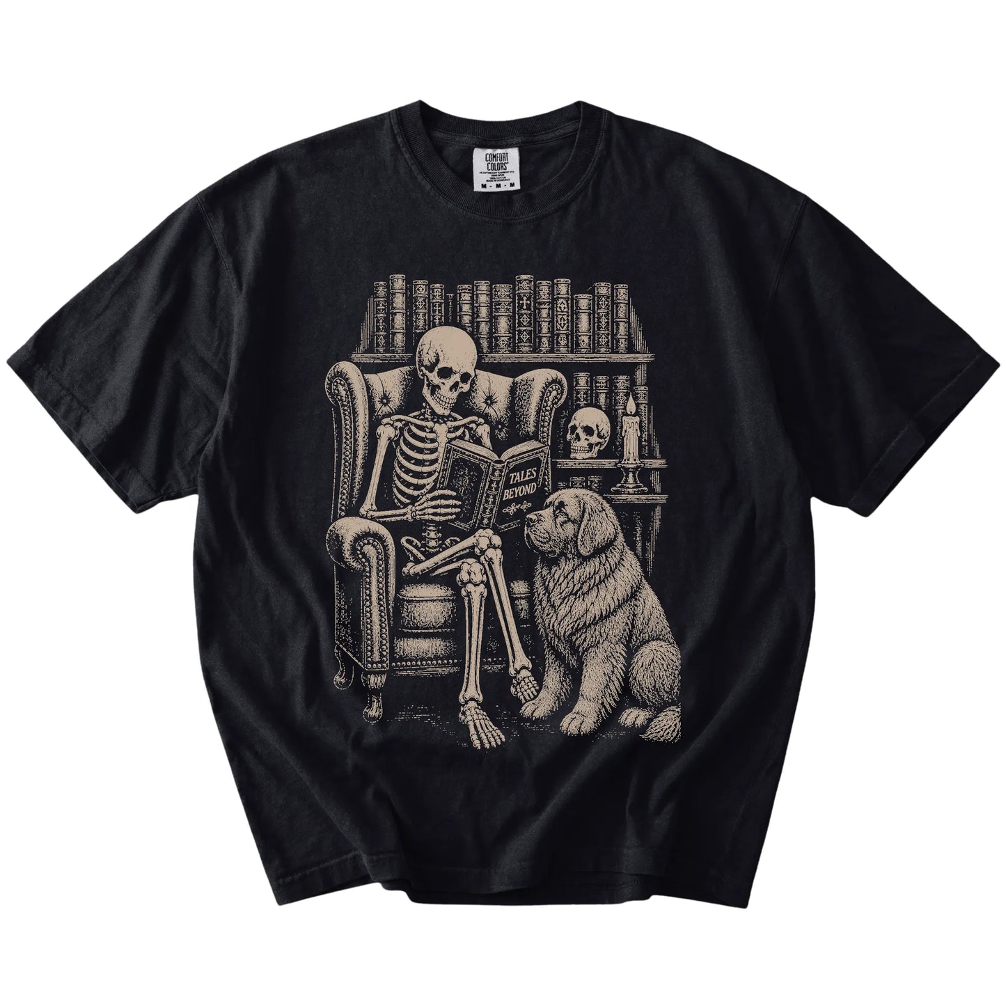 Skeleton reading in a library beside a Newfie on a Black Comfort Colors® T-shirt