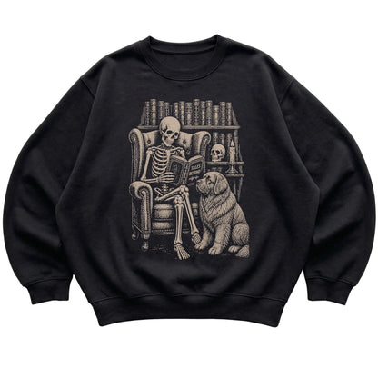 Skeleton reading Tales Beyond to a Newfie on a Black sweatshirt