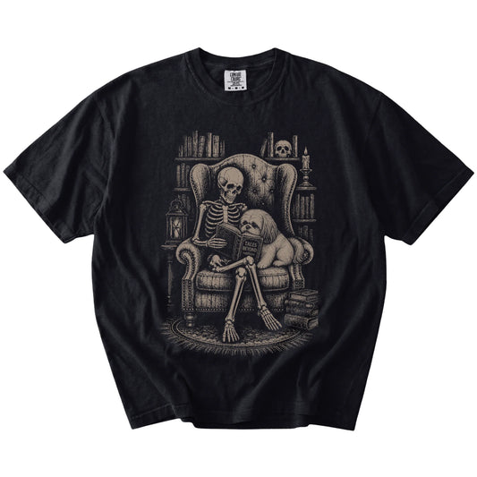 Skeleton reading in a library beside a Shih Tzu on a Black Comfort Colors® T-shirt