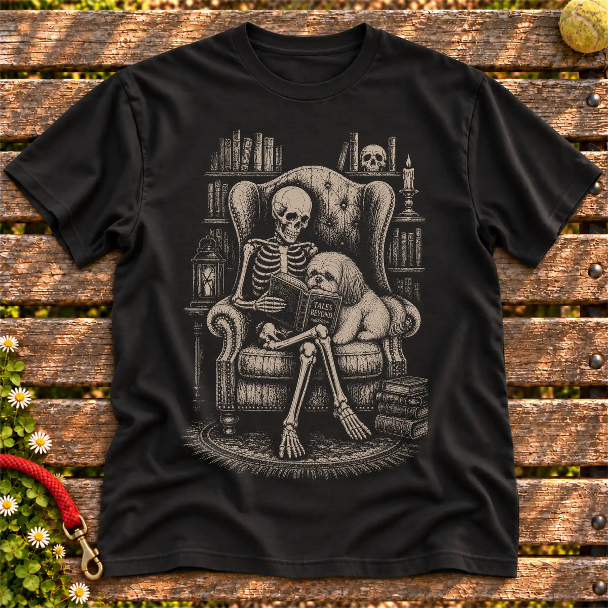 Shih Tzu Skeleton Reading Book on a Black T-shirt, shown flat