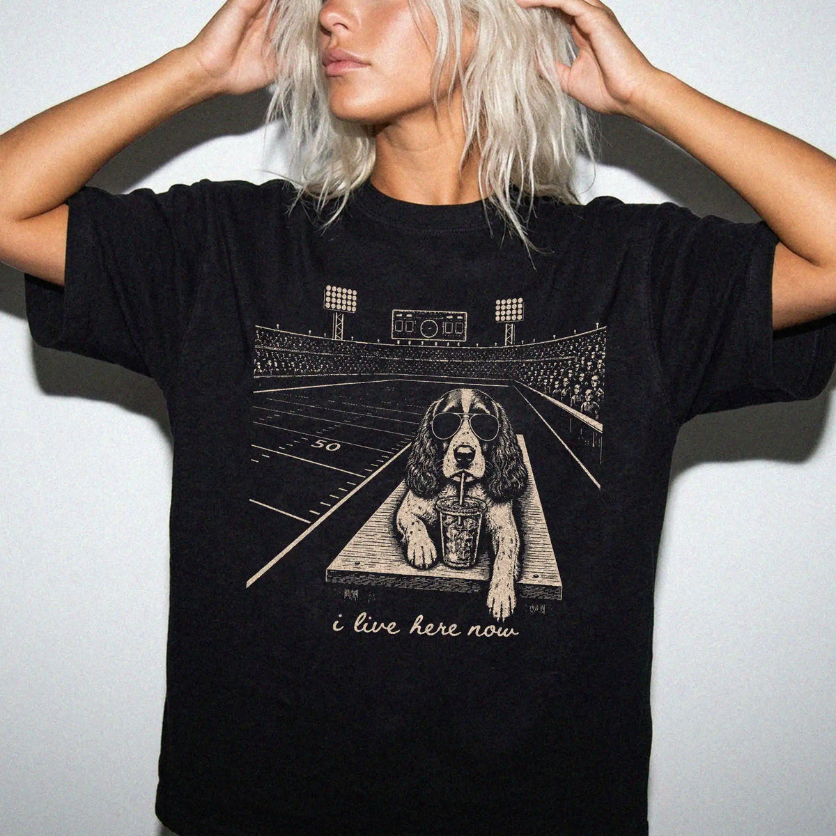 Model wearing a Black Comfort Colors® T-shirt featuring Springer Spaniel ready for football and tailgate season