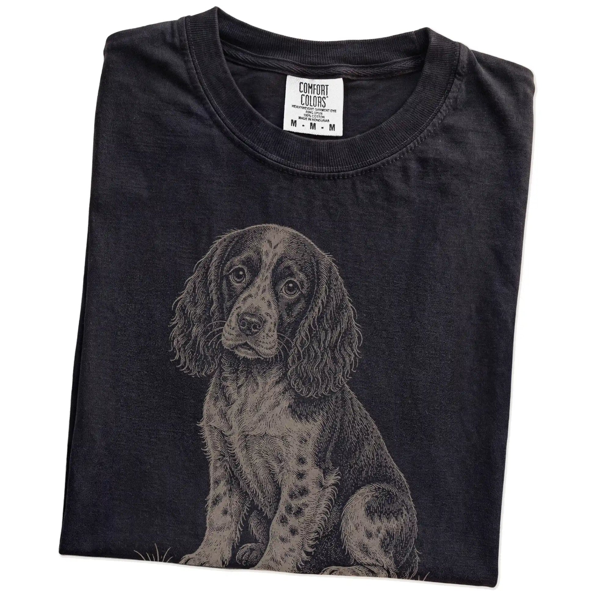 Folded Black Springer Spaniel Karma T-Shirt showing the graphic