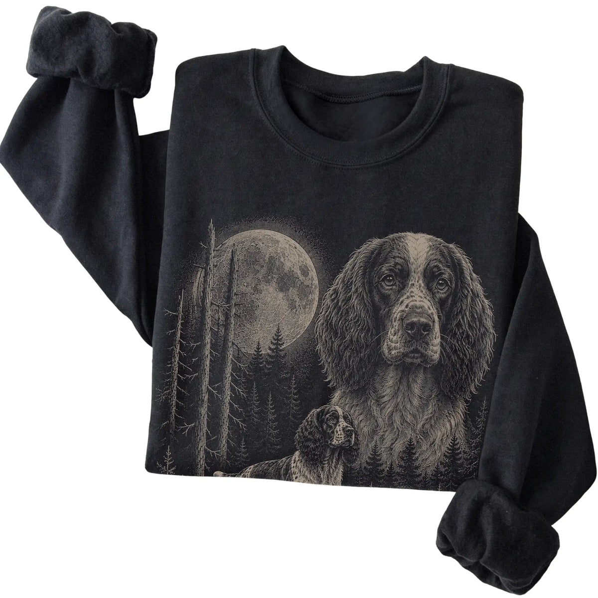 Folded black crewneck sweatshirt showing the Springer Spaniel Moonlit Forest graphic