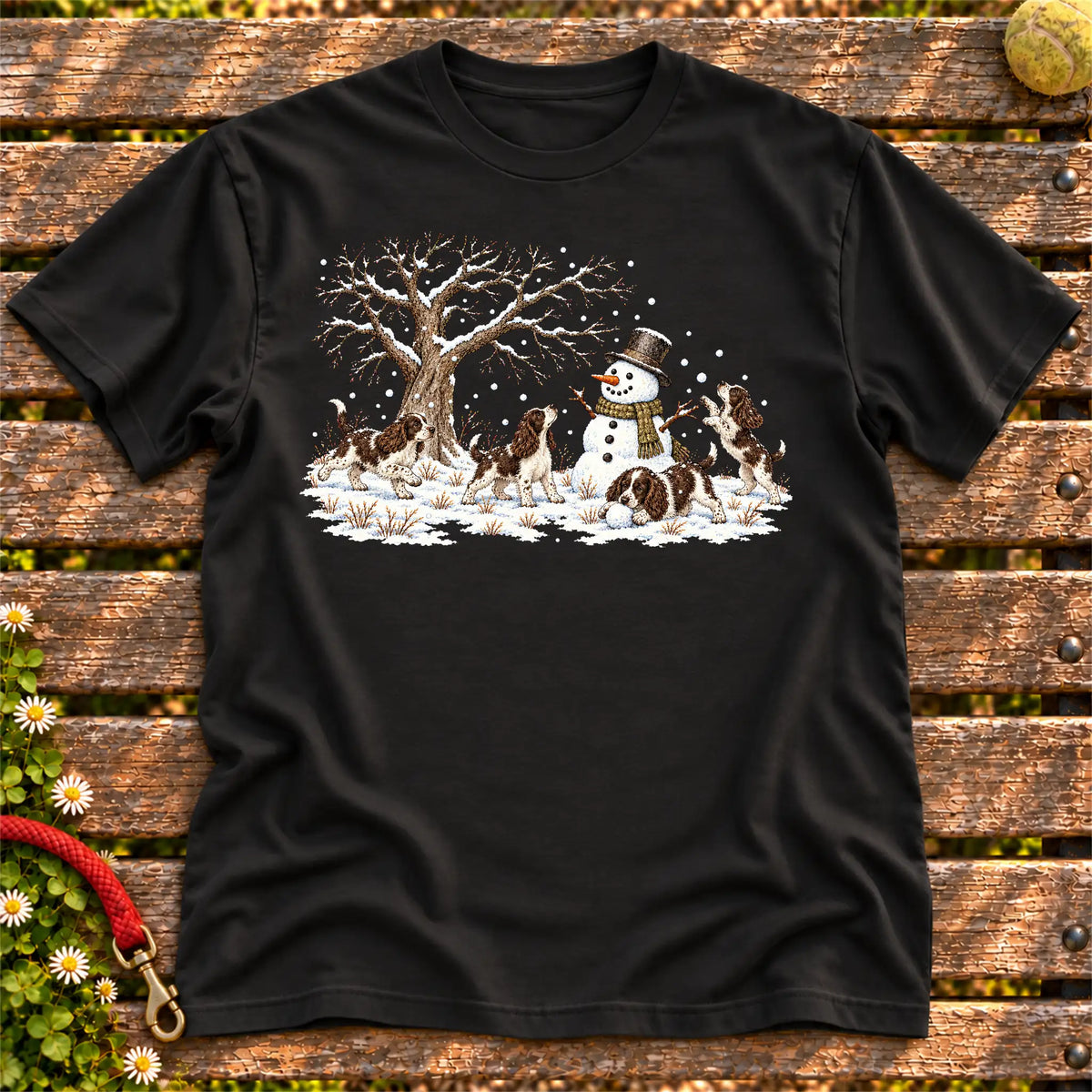 Springer Spaniel puppies playing in snow with a snowman on a Black T-shirt