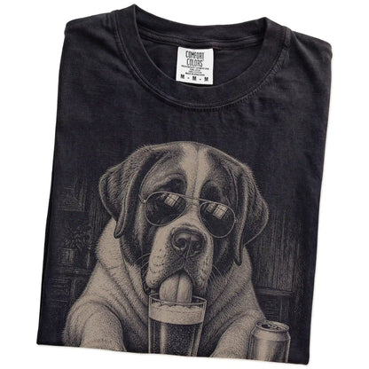 Folded Black Comfort Colors® t-shirt showing St Bernard sneaking a drink from a pint