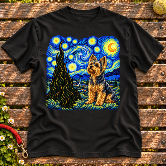 Colorful Yorkie beneath a swirling starry night sky on a Black T-shirt