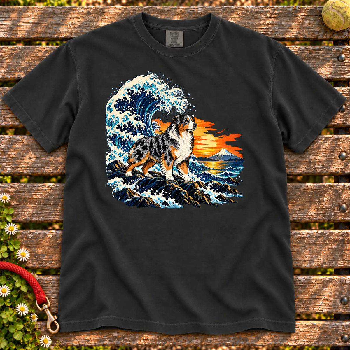 Australian Shepherd dog with ocean waves, sunset and Mount Fuji on a Black Comfort Colors T-shirt