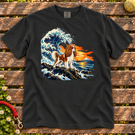 Cavalier King Charles Spaniel dog with ocean waves, sunset and Mount Fuji on a Black Comfort Colors T-shirt