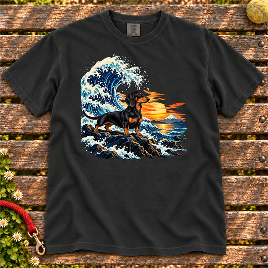 Dachshund dog with ocean waves, sunset and Mount Fuji on a Black Comfort Colors T-shirt