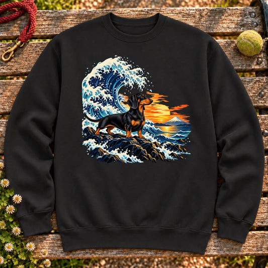 Dachshund dog with ocean waves, sunset and Mount Fuji on a Black Gildan crewneck sweatshirt