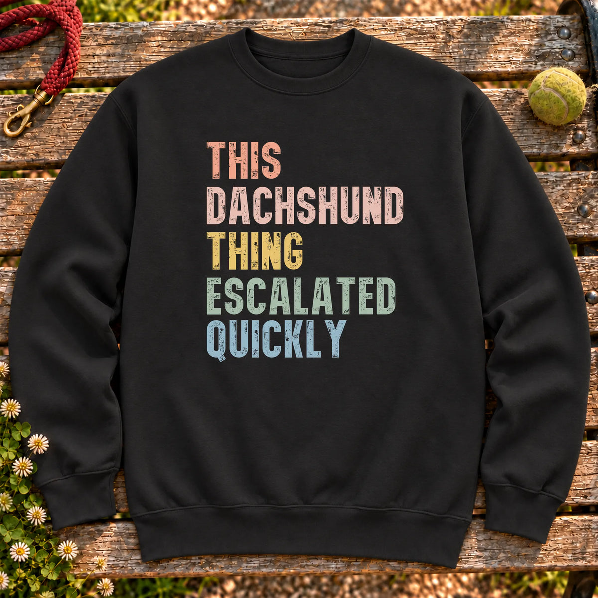 “This Dachshund thing escalated quickly” text on a Black sweatshirt