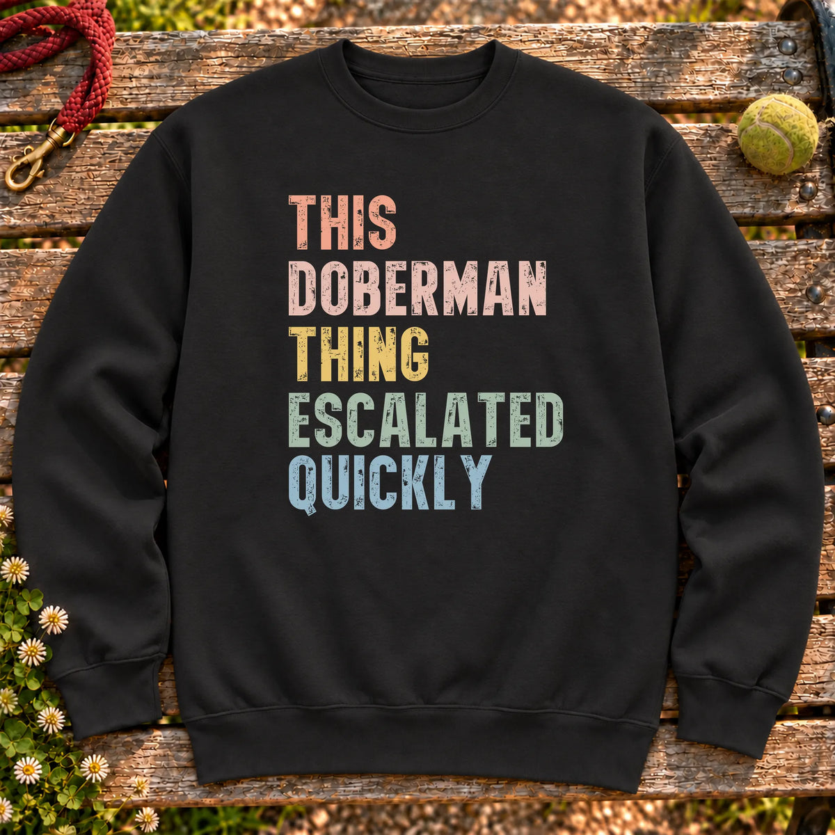 “This Doberman thing escalated quickly” text on a Black sweatshirt