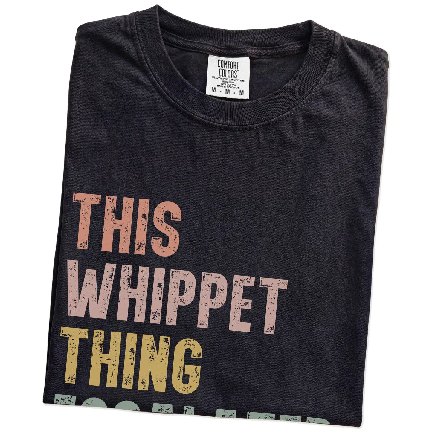 Folded Black Comfort Colors® T-shirt showing retro “This Whippet Thing Escalated Quickly” lettering