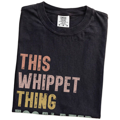 Folded Black Comfort Colors® T-shirt showing retro “This Whippet Thing Escalated Quickly” lettering