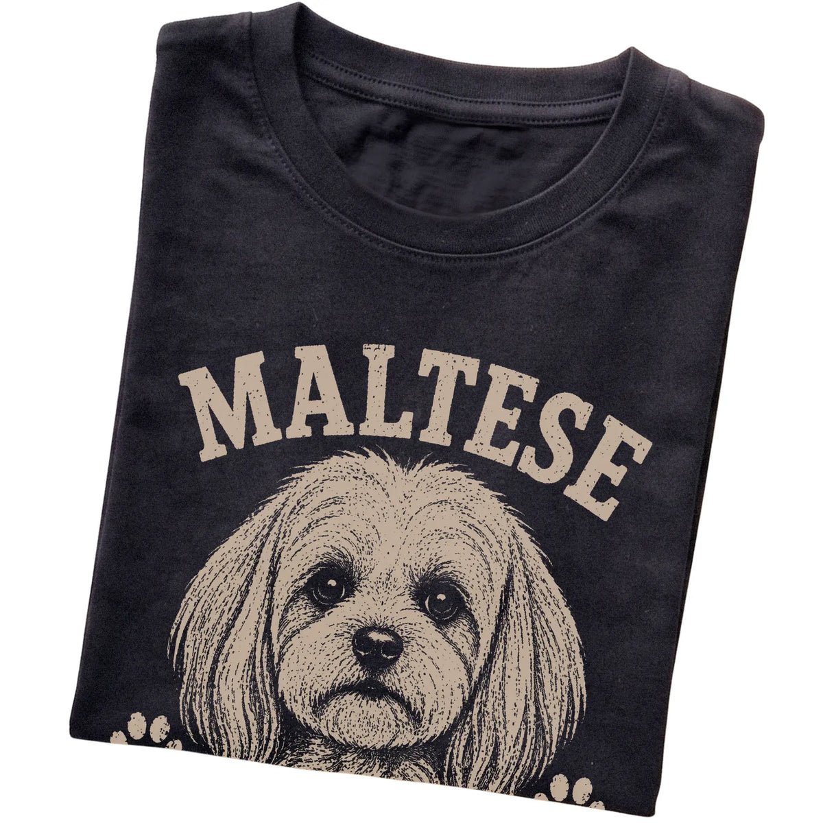 Black T-shirt featuring Tiny, Polished & Totally In Charge - Maltese, folded presentation