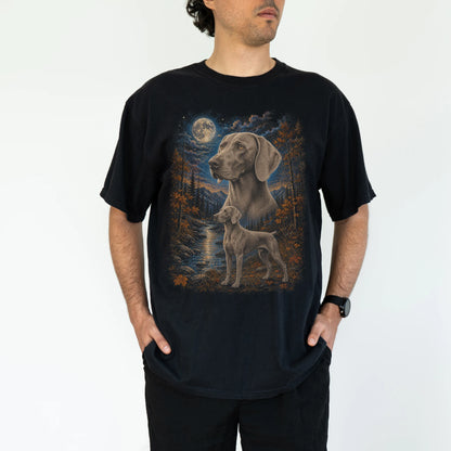 Model wearing a black T-shirt with Weimaraner Autumn Moon artwork.
