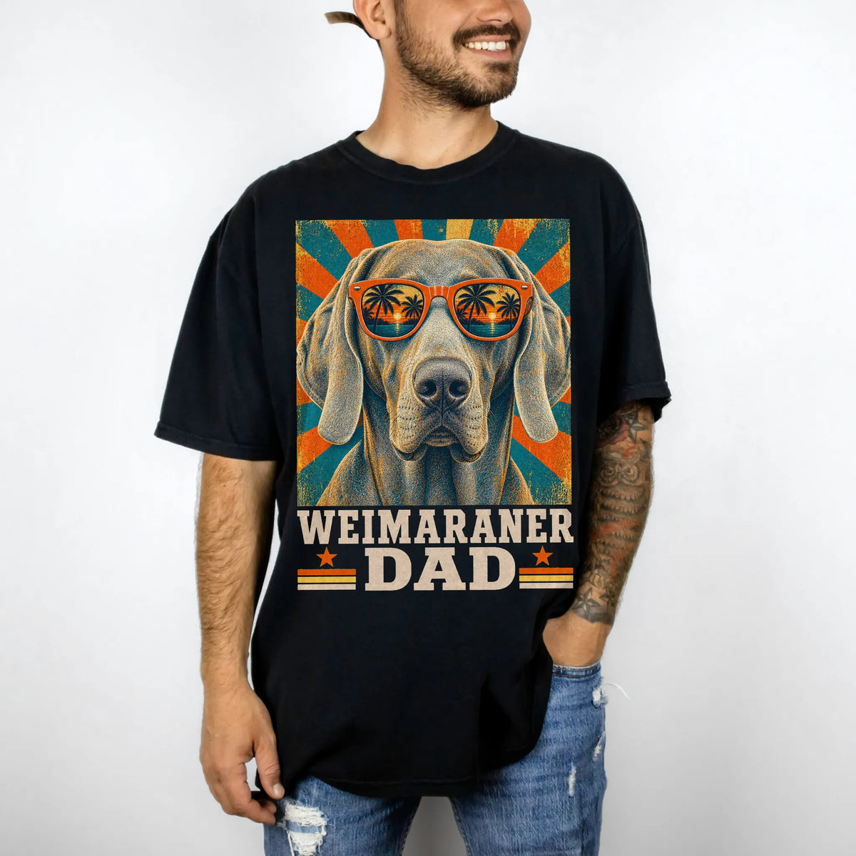 Retro Weimaraner Dad design on a Black Comfort Colors T-shirt worn by a model
