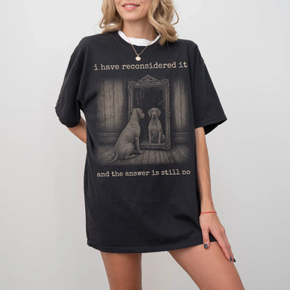 Model wearing a Black Comfort Colors® T-shirt with “the answer is still no” weimaraner design