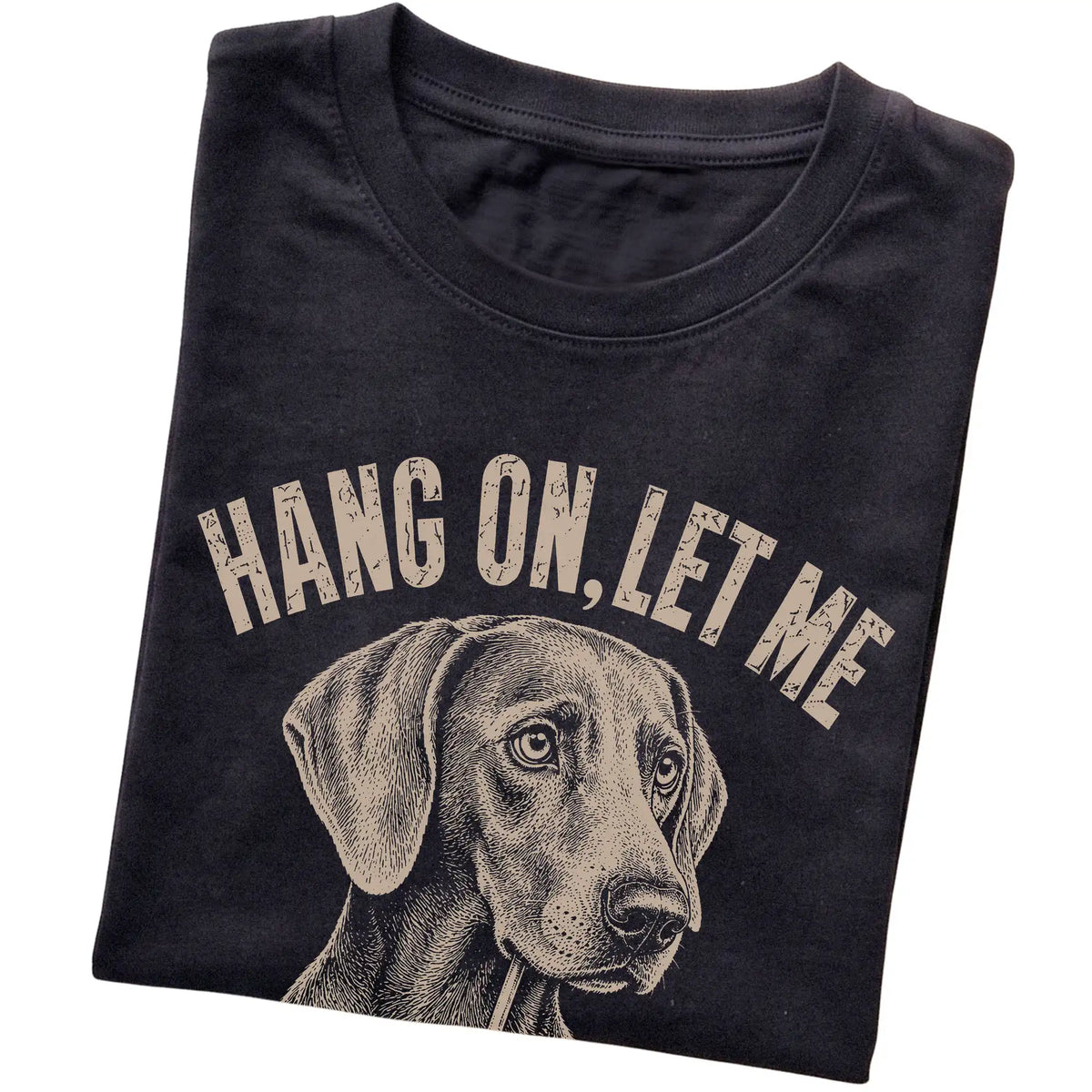 Black T-shirt featuring Overthinking Weimaraner, folded presentation