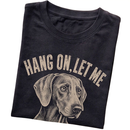 Black T-shirt featuring Overthinking Weimaraner, folded presentation
