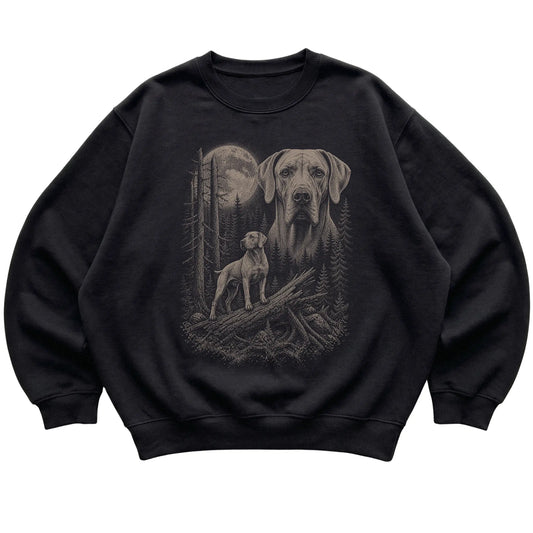 Weimaraner Moonlit Forest graphic on a black crewneck sweatshirt laid flat