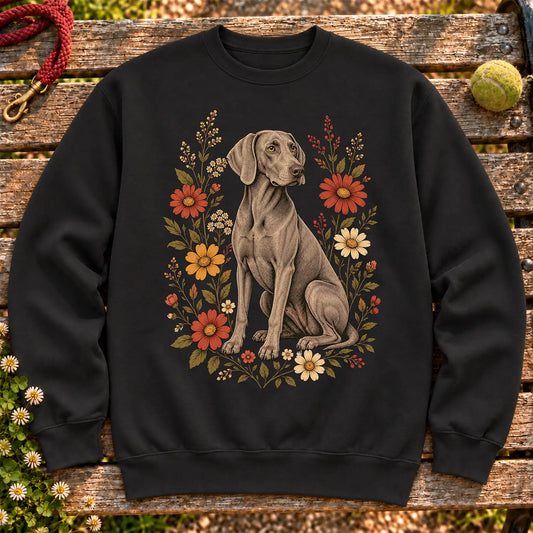 Weimaraner surrounded by wildflowers on a Black crewneck sweatshirt
