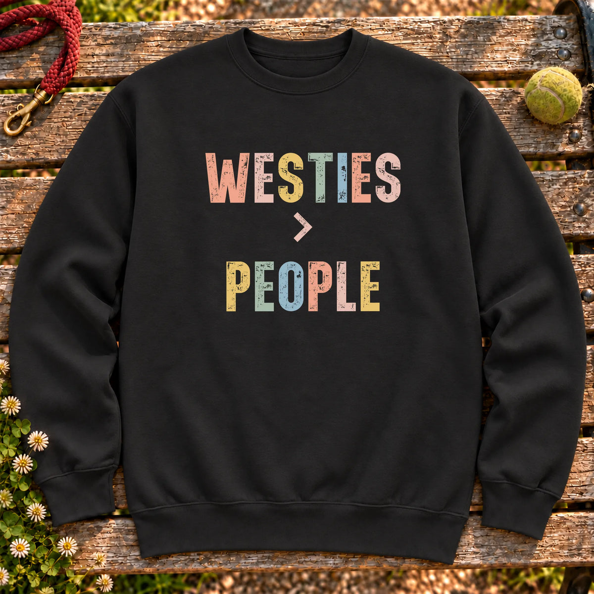 Westies greater than people text design on a Black crewneck sweatshirt
