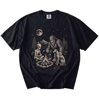 Whippet camping with Bigfoot and an alien on a Black Comfort Colors® T-shirt