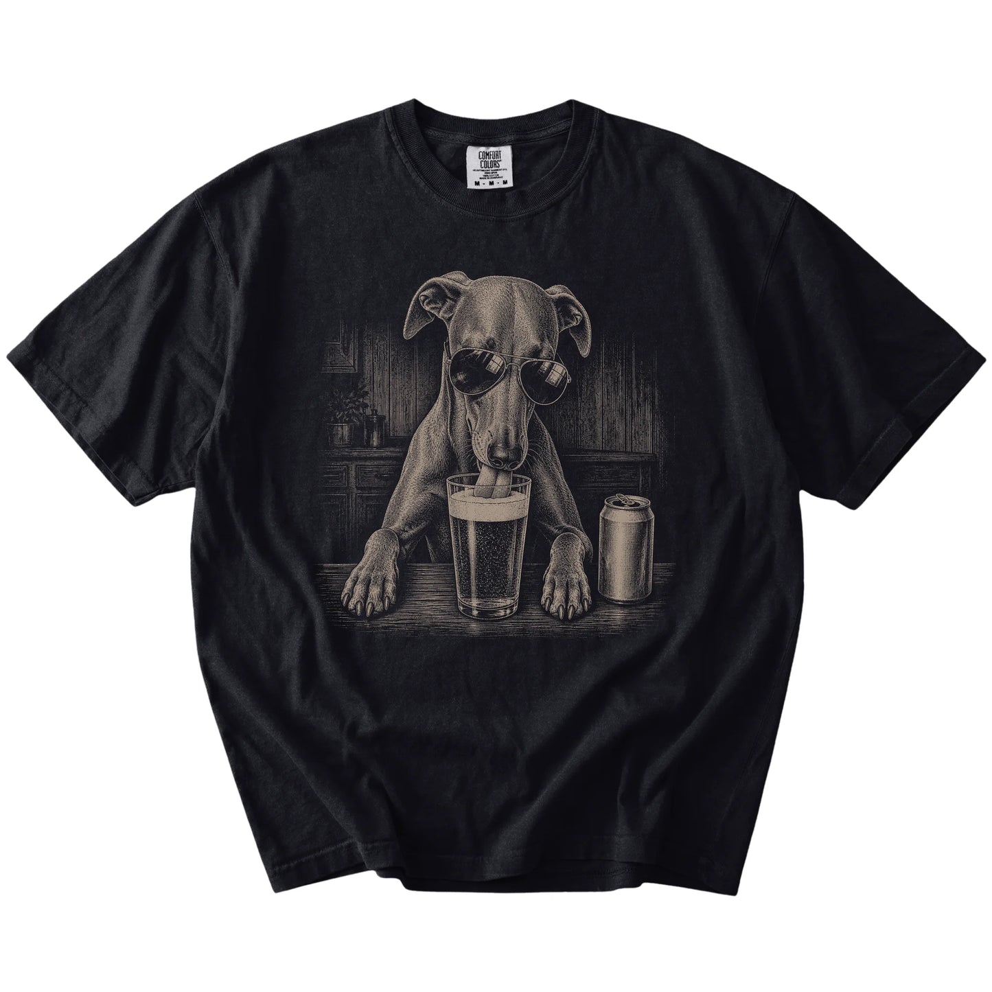 Whippet sneaking a drink from a foamy pint at home on a Black Comfort Colors® t-shirt