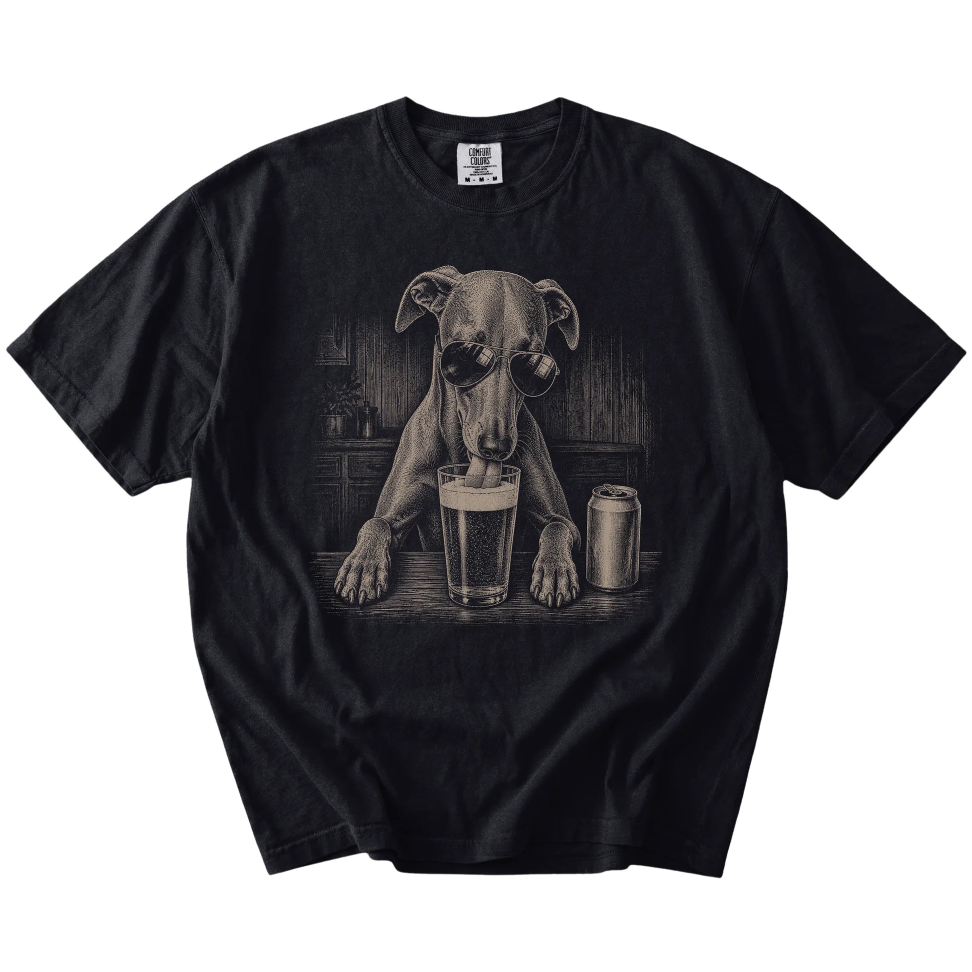 Whippet sneaking a drink from a foamy pint at home on a Black Comfort Colors® t-shirt