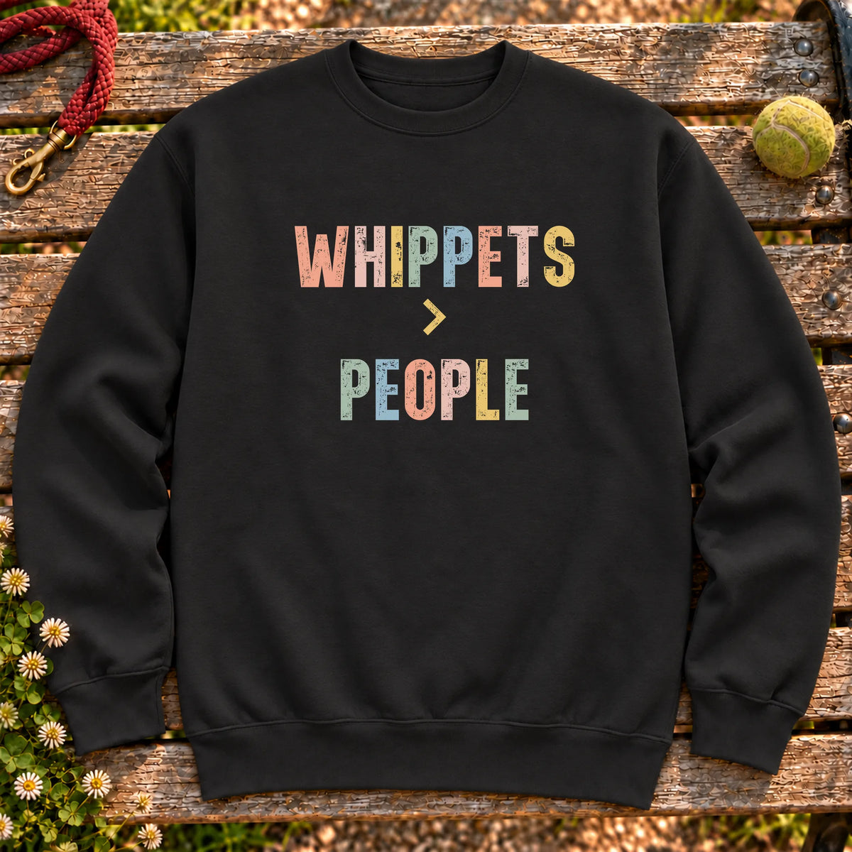 Whippets greater than people text design on a Black crewneck sweatshirt