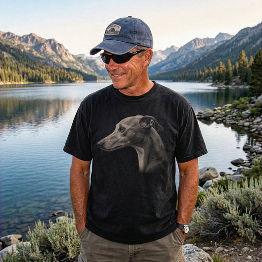 Model wearing a Black Comfort Colors® T-shirt with a detailed photographic portrait of a Whippet