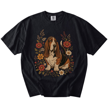 Basset Hound portrait surrounded by wildflowers beneath the moon on a Black Comfort Colors® T-shirt