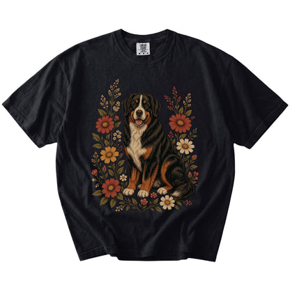 Bernese Mountain Dog portrait surrounded by wildflowers beneath the moon on a Black Comfort Colors® T-shirt
