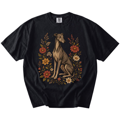 Greyhound portrait surrounded by wildflowers beneath the moon on a Black Comfort Colors® T-shirt