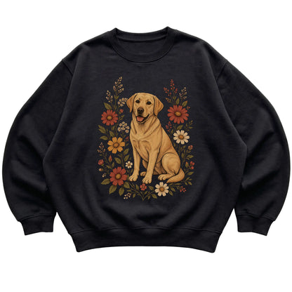 Black crewneck sweatshirt with Labrador Retriever portrait and wildflowers, flat lay