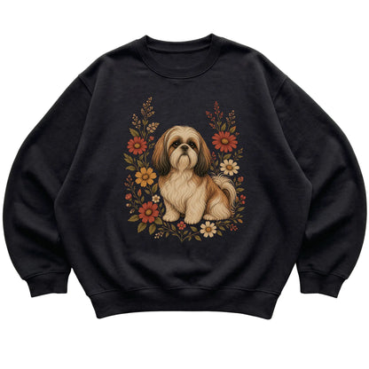 Black crewneck sweatshirt with Shih Tzu portrait and wildflowers, flat lay