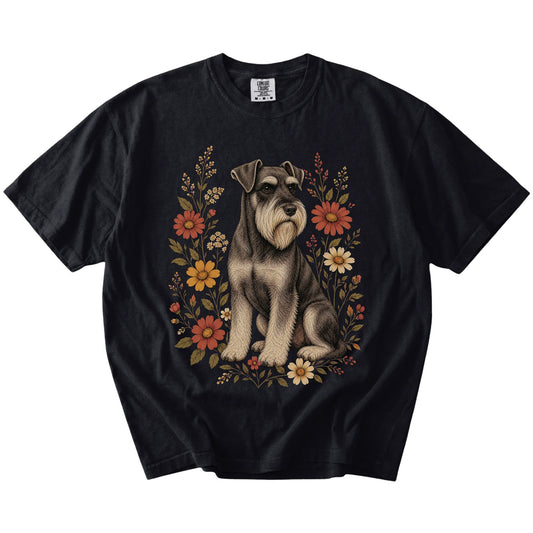 Standard Schnauzer portrait surrounded by wildflowers beneath the moon on a Black Comfort Colors® T-shirt