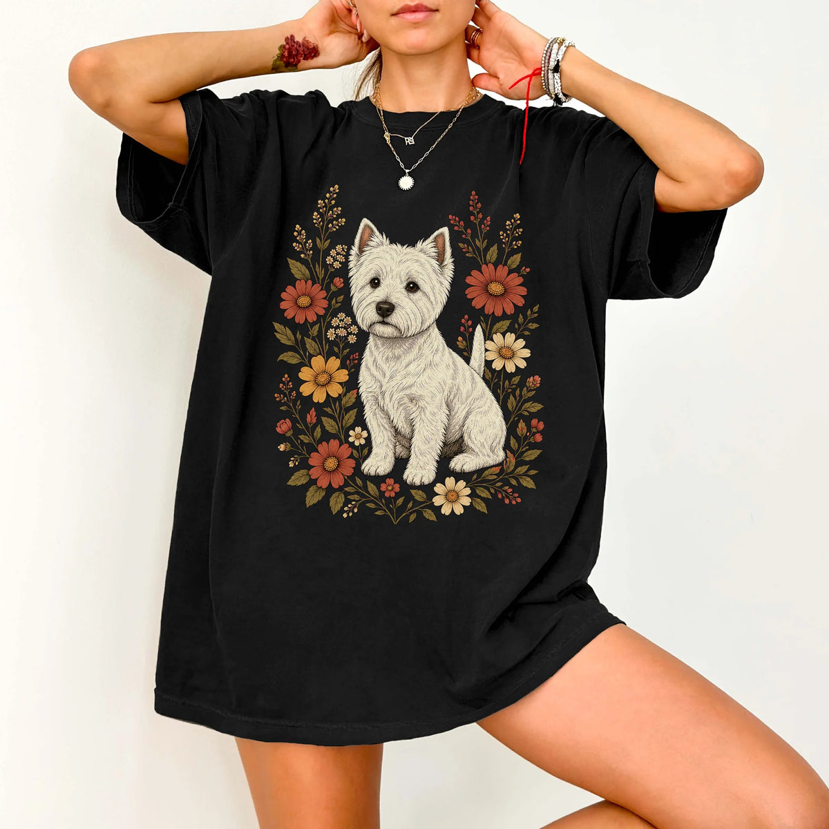 Model wearing a Black Comfort Colors® T-shirt showing Westie portrait surrounded by wildflowers beneath the moon