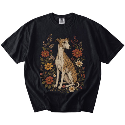 Whippet portrait surrounded by wildflowers beneath the moon on a Black Comfort Colors® T-shirt