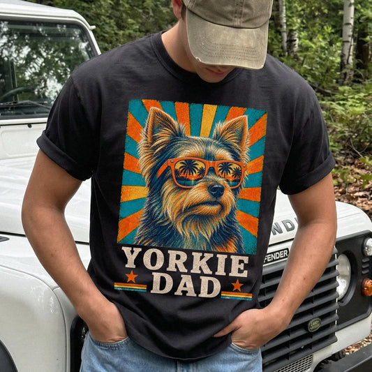 Retro Yorkie Dad design on a Black Comfort Colors T-shirt worn by a model