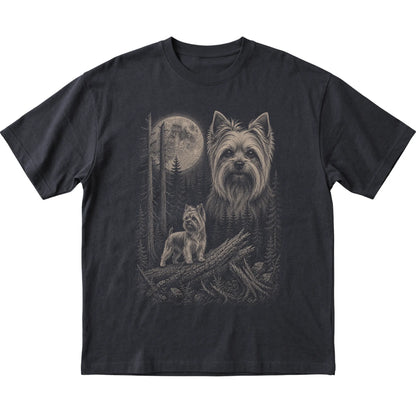 Yorkie Moonlit Forest graphic on a black Softstyle T-shirt laid flat