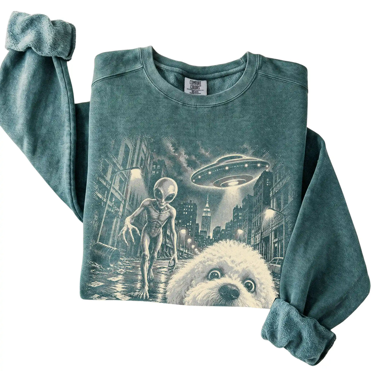 Bichon Frise Alien Selfie Comfort Colors Sweatshirt in Blue Spruce, folded view
