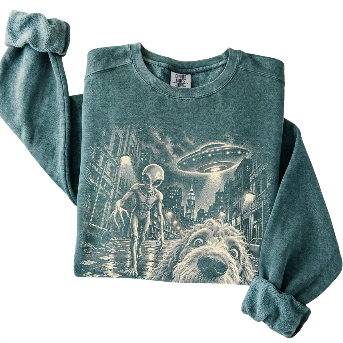 Goldendoodle Alien Selfie Comfort Colors Sweatshirt in Blue Spruce, folded view