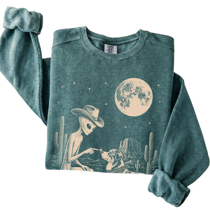 Blue Spruce Comfort Colors® sweatshirt featuring Australian Shepherd Cowboy and Alien, folded presentation